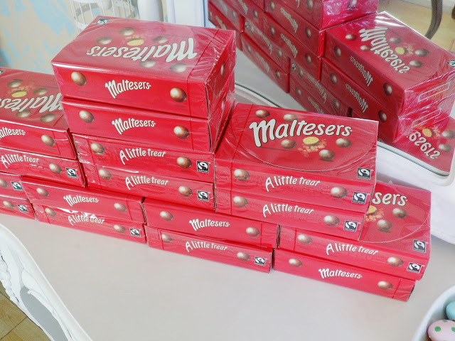 Lots of boxes of Malteasers chocolate